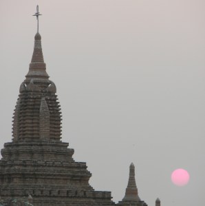 A pagoda, a Buddhist holy temple, at sunset.