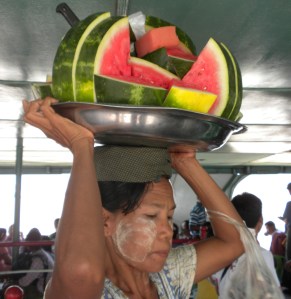 Women carry foods and other things on their heads.  