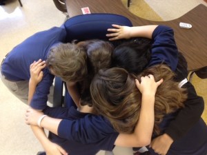 Class group hug, saying goodbye.