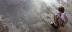 Kendall's poem fills the sidewalk.