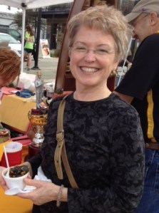 Ava enjoys paella at the Spanish Festival.