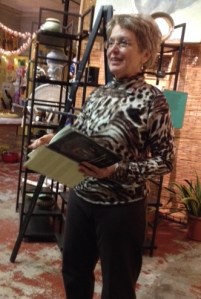 Ava reading at A&E Gallery.