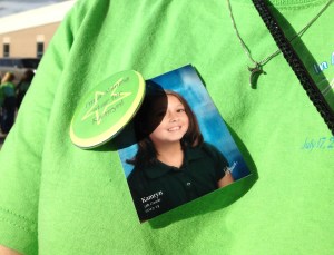 The button and Kamryn's picture on my t-shirt.