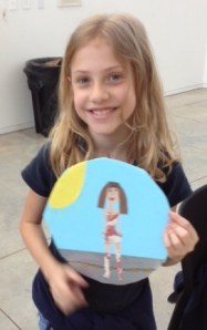 I am a girl. I am as yellow as a daffodil. I am curved like a cheerleader. I dance. I am feeling cheery. I wonder if I could join cheerleading. I can sing. I am a girl. by Emily