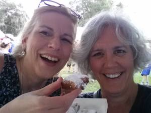 A selfie with my friend Sarah as we eat beignets at Festival Acadiens.  