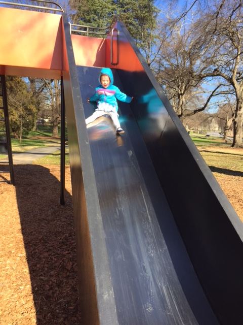The joy of being four on a big tall slide!
