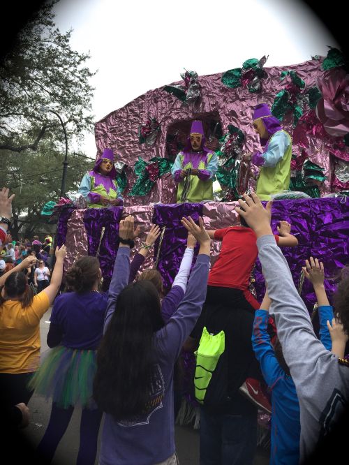 Hands up, beads flying