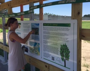 Katherine looks at the neighborhood commemoration of Hurrican Katrina, 10 years later. 