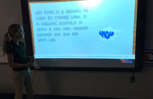 Emily presents A Handful of Stars on Powtoon. Notice the hand with blueberries.