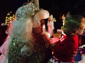 Her Royal Highness talks the queenly talk with an itty bitty princess. 