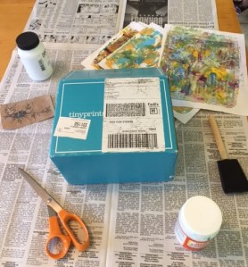 I started with a box from Tiny Prints (Our Christmas cards came in this box.)