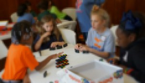 Students play strategic games at Gifted by Nature Day.  