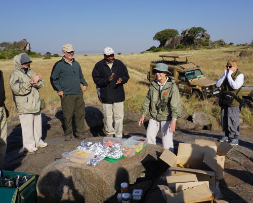 Singing "Happy Birthday" to Anne on the kopjes breakfast. 