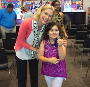 Madison shows off her first place medal.
